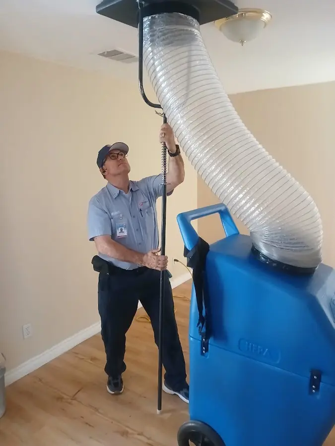 Mini Split Installation technician using HEPA equipment in Akron